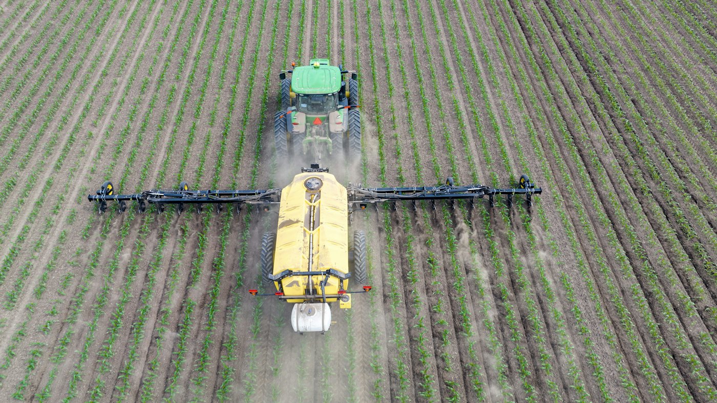 Aerial view of fertilizer application in a field
