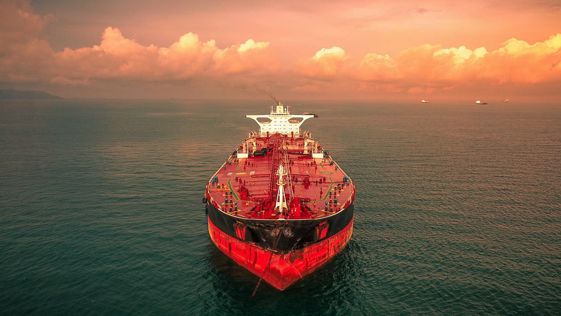 Tanker on the open sea at sunset